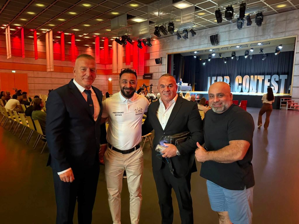 Four men in the hall of the Mr. Universe Switzerland 2026 competition.