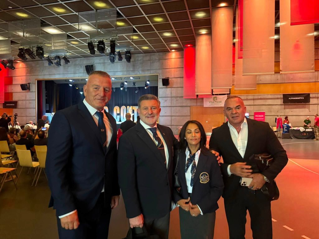 FBBFK representatives with officials in the competition hall in Zurich.