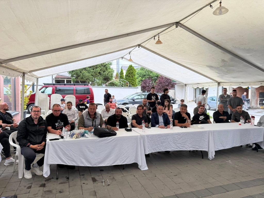 Judges and officials at the table of the strength competition in Gjilan, 2026.